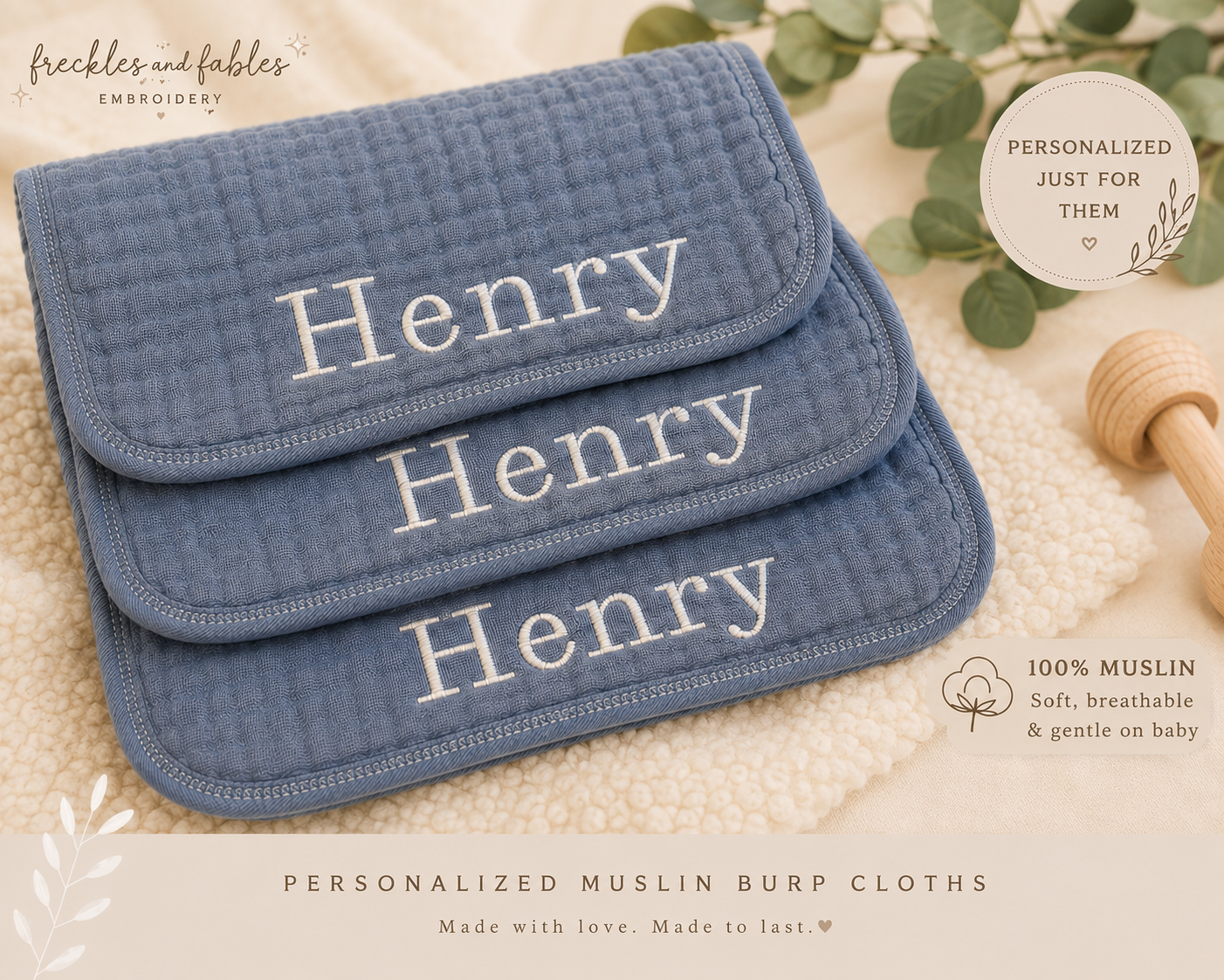 Three blue muslin burp cloths embroidered with the name Henry